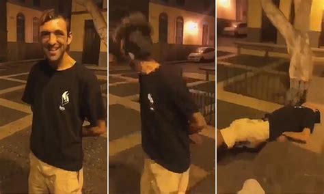 shocking moment homeless man is knocked out after thugs pay £4 to smack him in the face