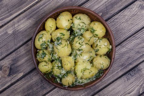 With just a bit of butter and no cream, they've got a healthy twist. Boiled Potatoes With Dill, Garlic And Butter In A Plate On ...