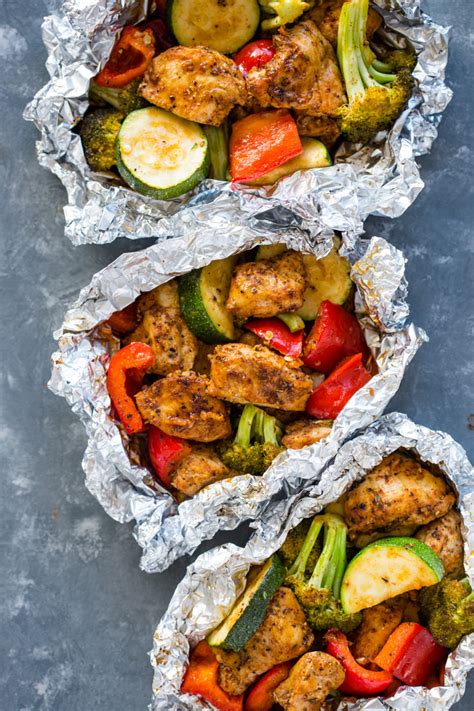 The secret to juicy oven baked chicken breast is to add a touch of brown sugar into the seasoning and to cook fast at a high temp. Foil Pack Cajun Chicken and Veggies | Gimme Delicious