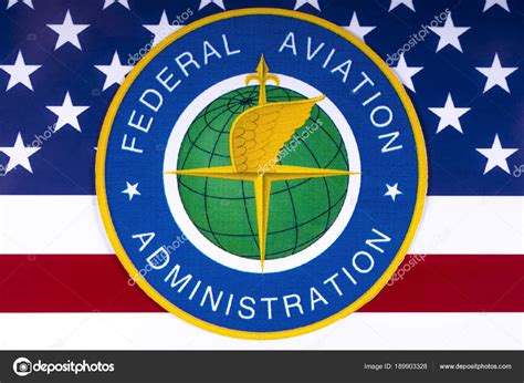 Federal Aviation Administration Logo And Us Flag Stock Editorial
