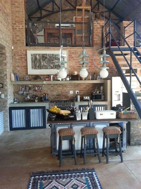 Charming Rustic Interior Of A Two Story High Ceiling Studio Cottage The Industrial Lamps With
