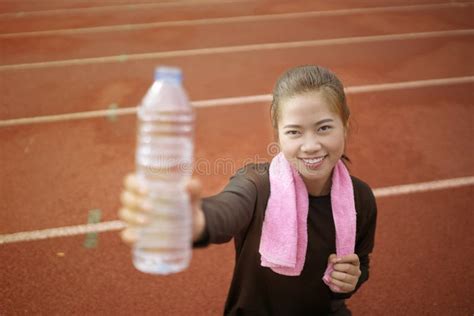 Runner Woman Drinking Water While Exercises Stock Photo Image Of Rest