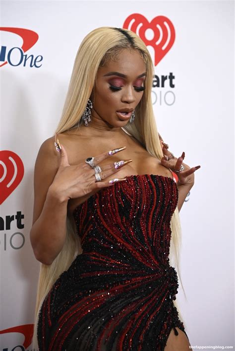 Saweetie Flaunts Her Boobs At The Iheartradio Music Festival Photos Updated