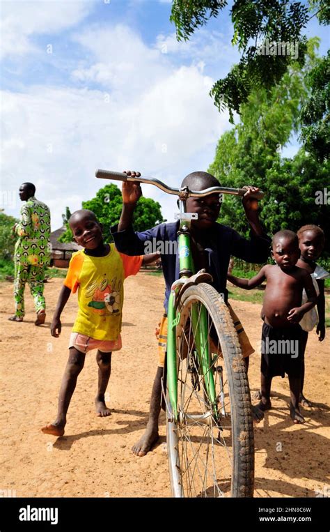 Cute Burkinabe Boys Playing In Their Village In Central Burkina Faso