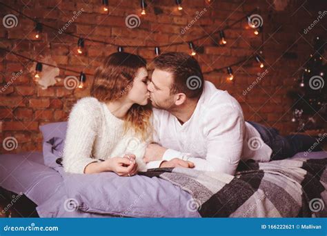 couple kissing in bed stock image image of affection 166222621