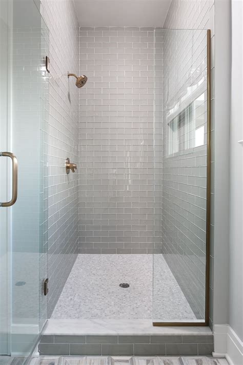 Pale green glass subway tile for walls. Bernadette | Glass tile shower, Subway tile showers, Glass ...