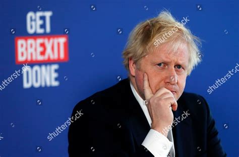Britains Prime Minister Boris Johnson Listens Editorial Stock Photo