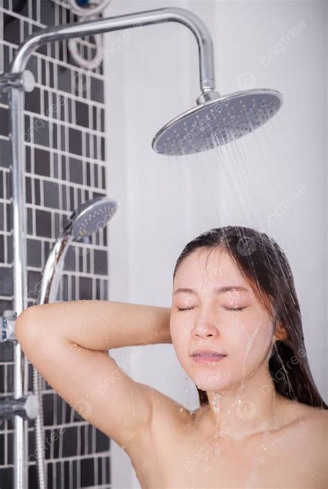 Woman Is Washing Her Hair And Face By Rain Shower Head Photo Background