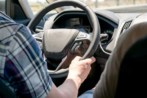 Drivers Hands On Steering Wheel Inside Of A Car Stock Image Image Of