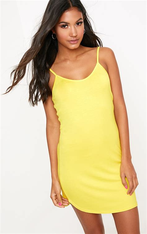 Yellow Jersey Curved Hem Strappy Bodycon Dress Dresses Prettylittlething