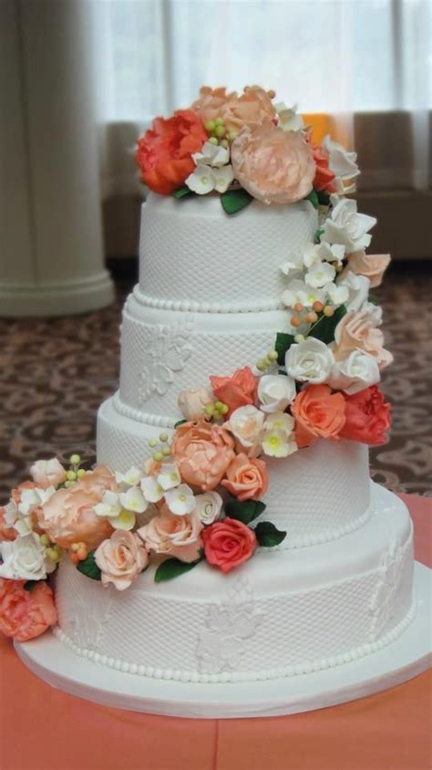 Coral Themed Wedding Cascading Flowers Are Completely Made Out Of