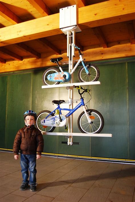 Lift can be used for safely lifting and storing motorcycles, trikes, lawnmowers, snowmobiles, atv's and more! Flat-Bike-Lift: Ingenious Way To Park Your Bicycle On The ...