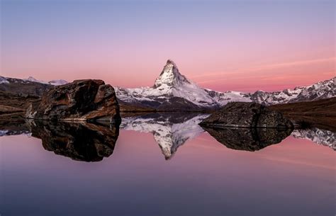 The Matterhorn And Its Reflection In The Stellisee Just Before Sunrise