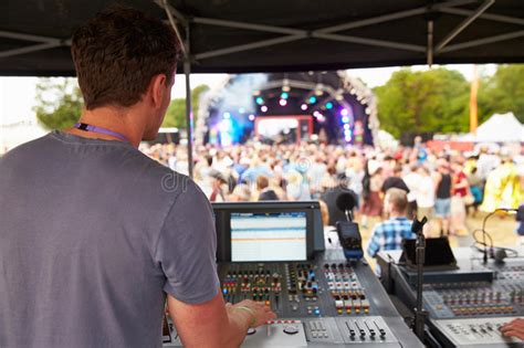 Sound And Lighting Engineer At An Outdoor Festival Concert Stock Photo