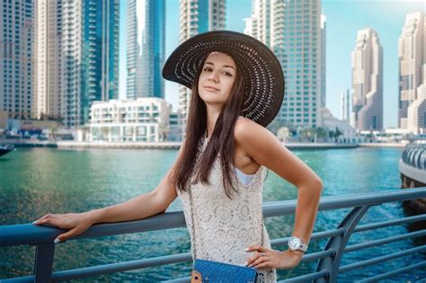 Premium Photo Happy Young Traveler Woman In Big City Dubai