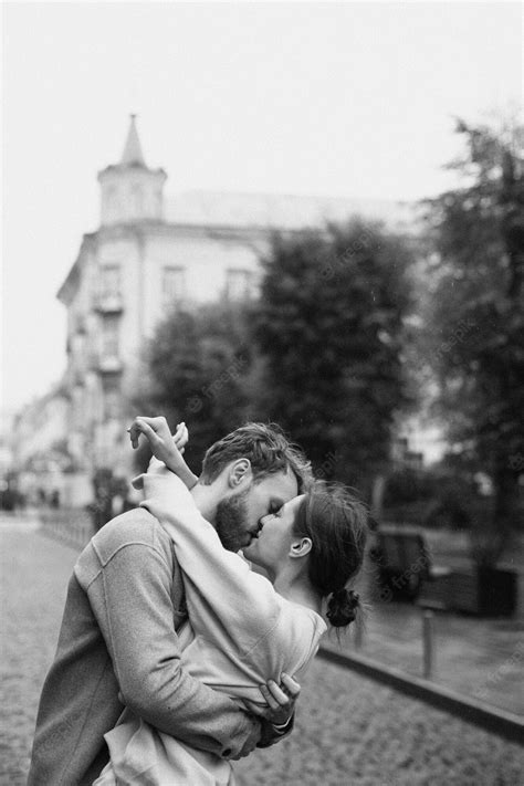 Free Photo Side View Romantic Couple Kissing Outdoors
