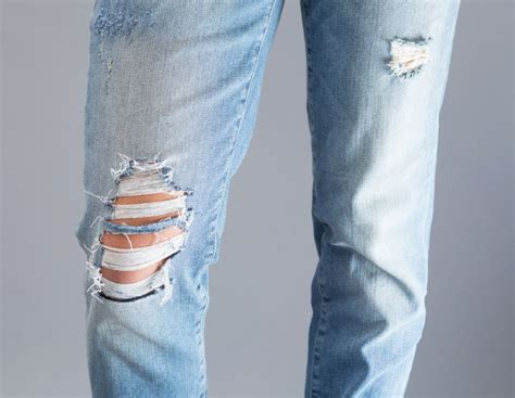 How To Distress Your Jeans In 7 Easy Steps How To Rip Your Jeans Diy