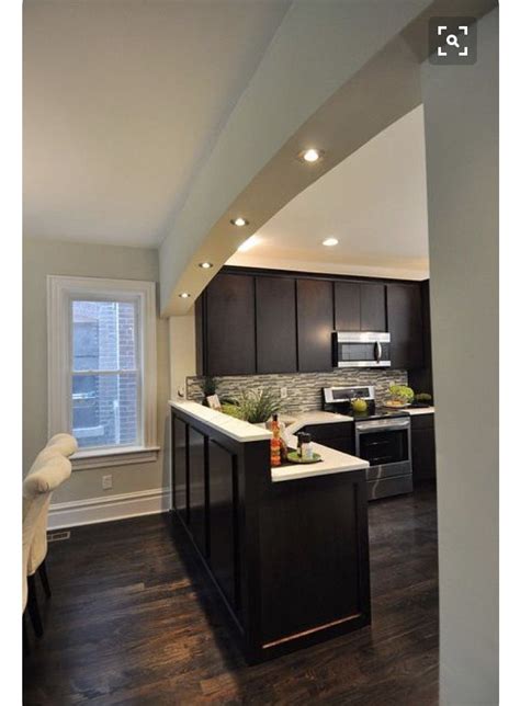 Making an illusion of being in a different area. Idea to open up kitchen to formal dining by making a half wall with bar. #OpenConcept | Kitchen ...