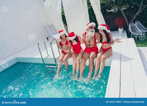 Photo Of Funky Cool Santa Claus Snow Maidens Wear Red Bikinis Enjoying
