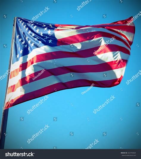 Antique Effect Large American Flag Waving Stock Photo 553755064