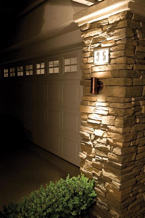 Evocative bands of light and volume effects wall throws from stone wall. Stone wall lights - a way of lighting up wall decors ...