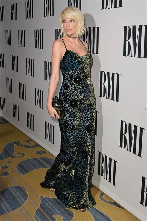 Taylor Swift Bares Cleavage At The Bmi Pop Awards In Beverly Hills