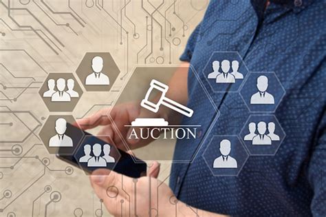 Online Auctions On The Touch Screen With A Blur Background Of The