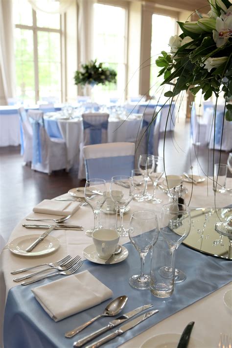 Sky blue table runner and sashes Stubton Hall www.modernheritagestyling