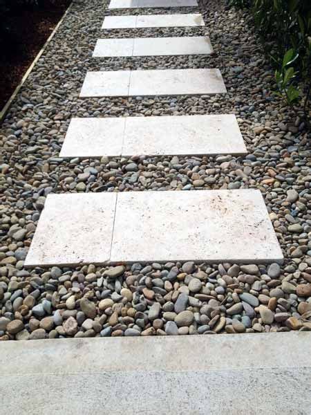 Pebbles are currently very trendy, with landscape designers using them as mulches, in mosaics and paving, and to surface paths and driveways. Travertine stepping stones. Beautiful modern looking ...