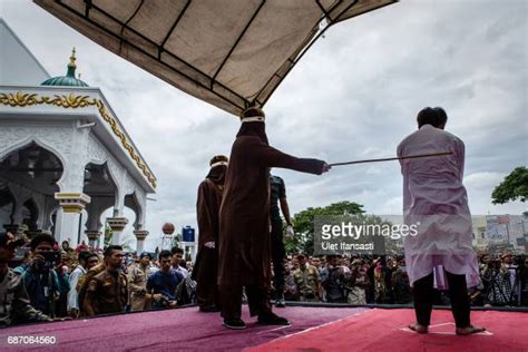 Indonesian Gay Couple Sentenced To Public Caning In Aceh Photos And