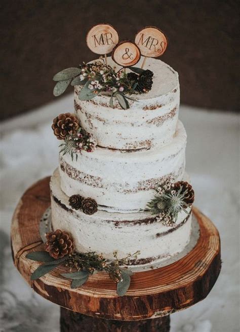 Amaryllis and kumquat winter wedding centerpiece. 20 Whimsical Winter Wedding Cakes to Love - EmmaLovesWeddings