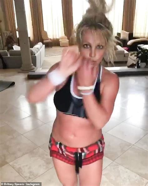 Britney Spears Flaunts Her Toned Abs As She Works Up A Sweat During A