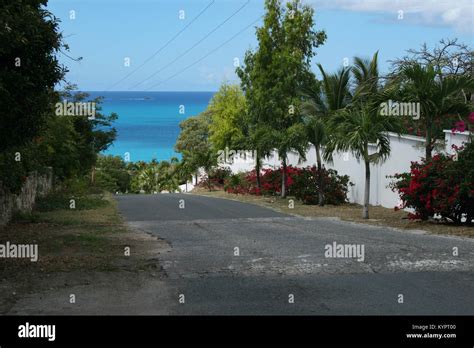 Street Leading To Beautiful Blue Waters Of Tropical Beach In St Martin