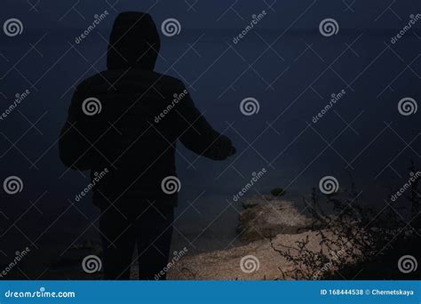 Man With Flashlight Walking Near River Stock Photo Image Of Light
