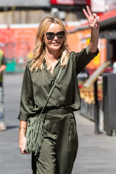 amanda holden goes braless as she sizzles in clingy green silk shirt and trousers daily star