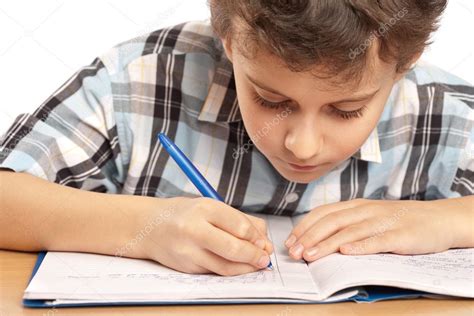 Schoolboy Doing Homework Stock Photo By ©xalanx 2007899
