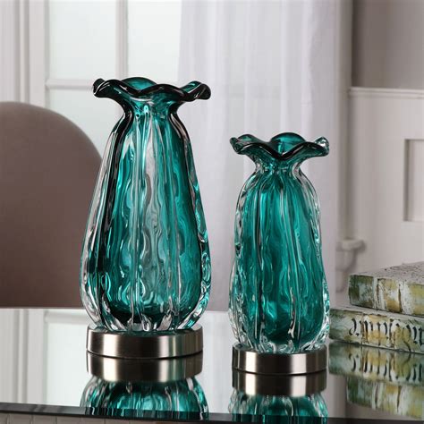 Beauty And Elegance Exudes From These Thick Teal Glass Vases Accented
