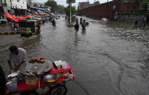 Photos Heavy Monsoon Rains Flood Roads In Lahore News Photos Gulf News