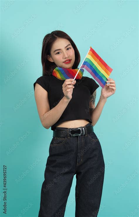 Lgbtq Girl And Pride Flag Sexy Lesbian Girl And Lgbtq Flag Standing Blue Green Background