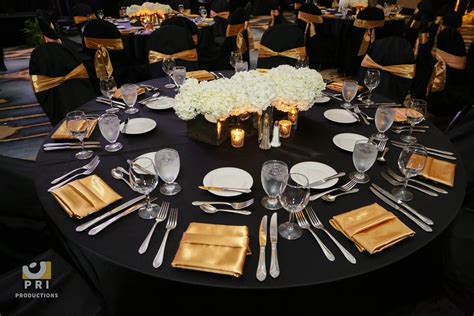 Black And Gold Color Themed Table For A Dinner Reception Tablescapes