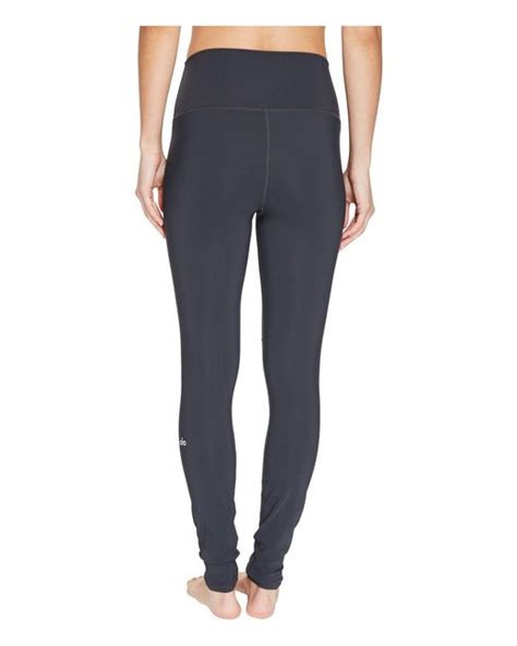 Alo Yoga Synthetic Ripped Warrior Leggings Save Lyst