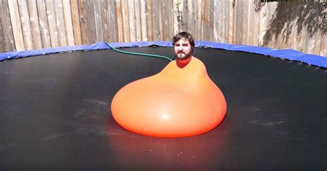 The Slow Mo Guys Took Their Giant Water Balloon Antics One Step Further Completely Submerging