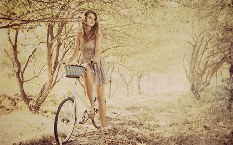 Download Beautiful Girl Riding Bicycle In Autumn Forest Hd By