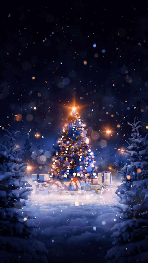 Download A Beautiful Snowy Christmas Eve Night Wallpaper