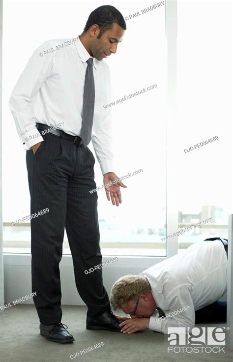 Businessman Kissing Boss Feet Stock Photo Picture And Royalty Free