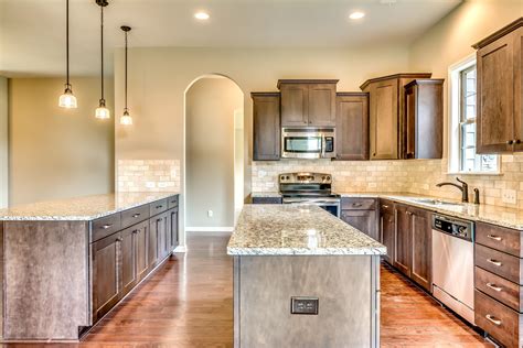 Gorgeous Open Concept Kitchen With Stainless Steel Appliances Granite