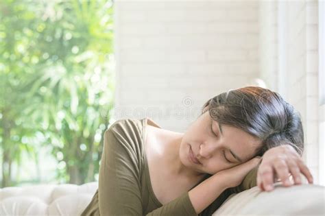 closeup tired woman sleep at the sofa in room textured background stock image image of room