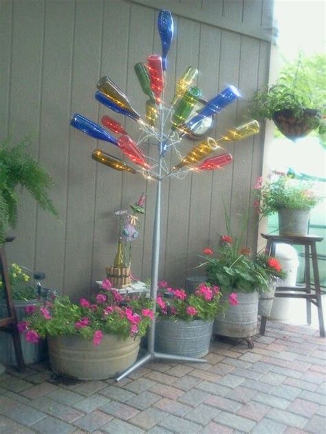 We used a treated post from home depot. Bottle tree | Bottle tree, Diy projects, Diy