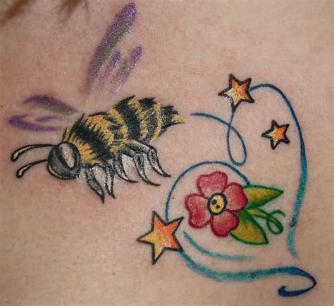 Cool Bumblebee With Flower Tattoo Design