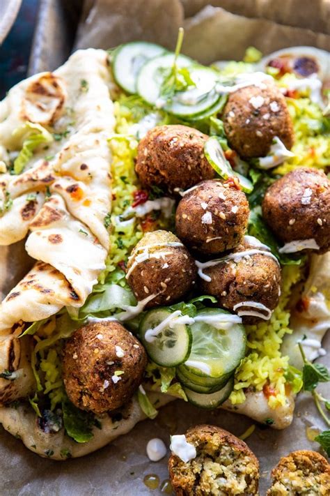 With baked greek falafel, a unique and tasty green tahini sauce plus some homemade naan (if you're up for it), this sandwich makes for a delicious and satisfying dinner. Falafel Naan Wraps with Golden Rice and Special Sauce ...